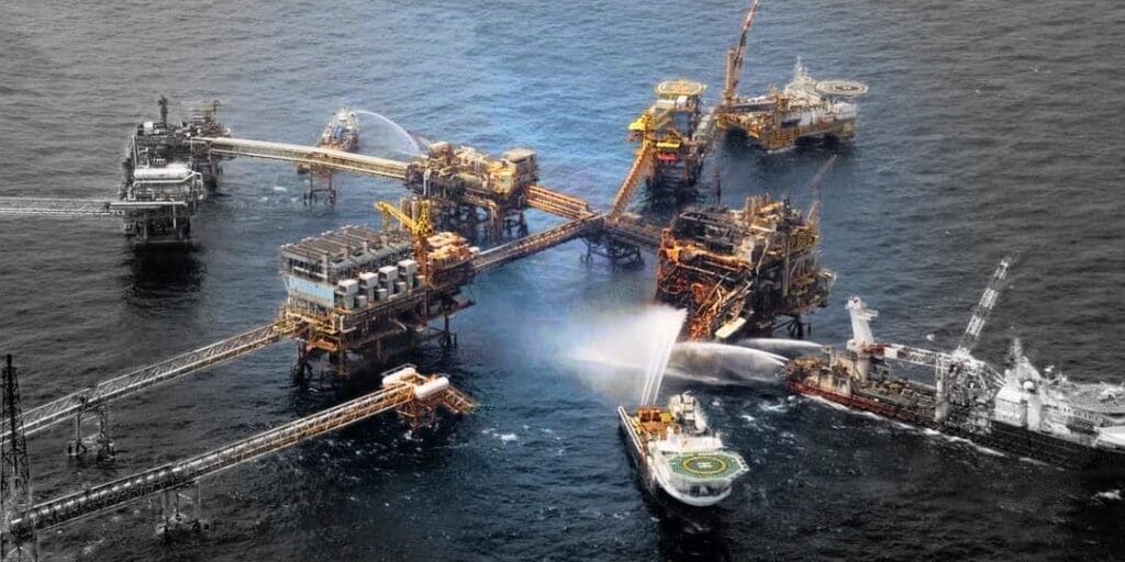 Oil rig standing idle after production halt, machinery and equipment inactive