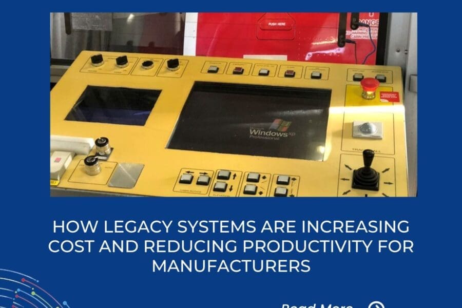 Legacy Windows XP operated equipment in a factory setting, showing how outdated systems raise operational costs and create vulnerabilities to manufacturing cyberattacks in critical infrastructure.