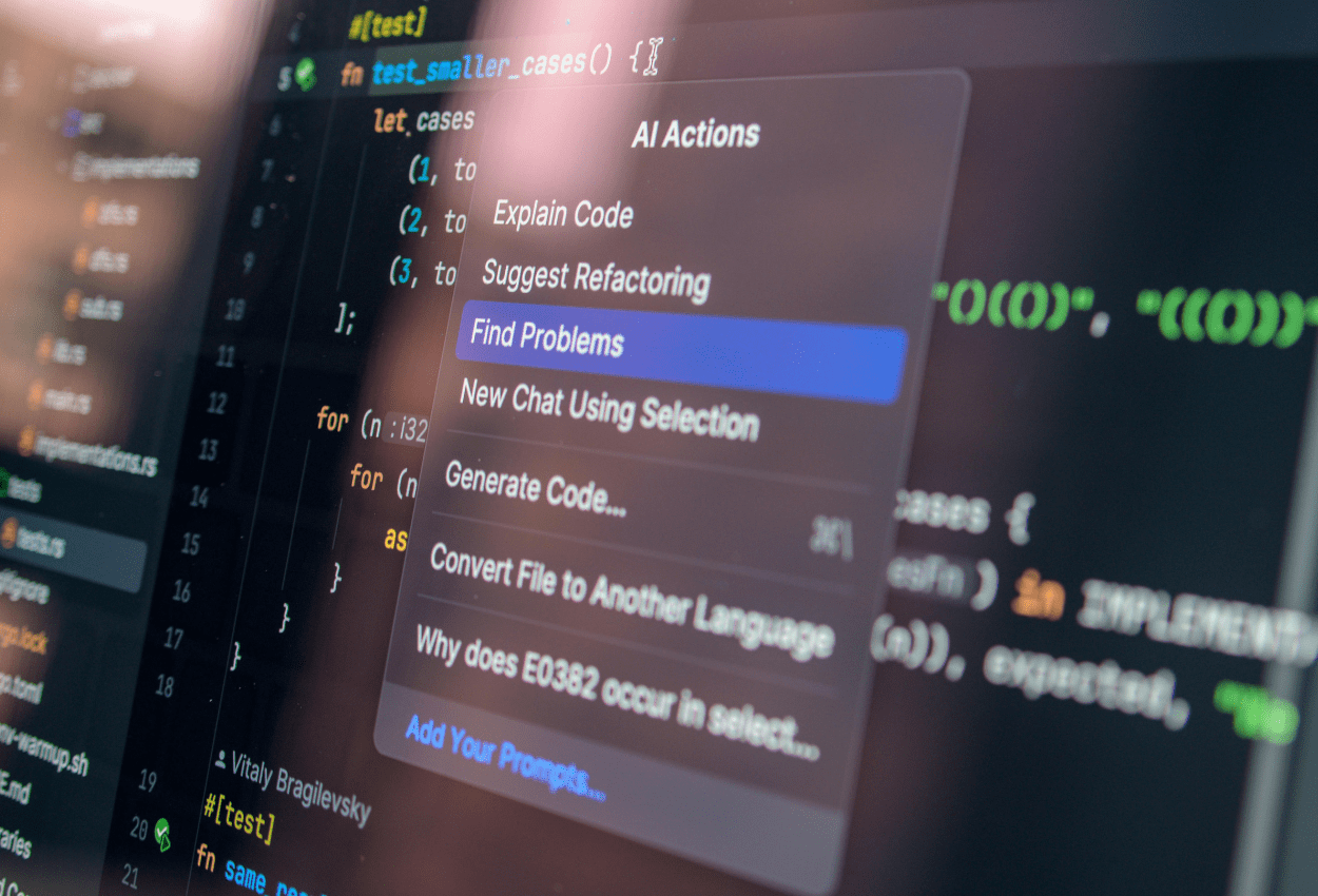 Developer using an AI coding agent to analyze and troubleshoot code in a software environment